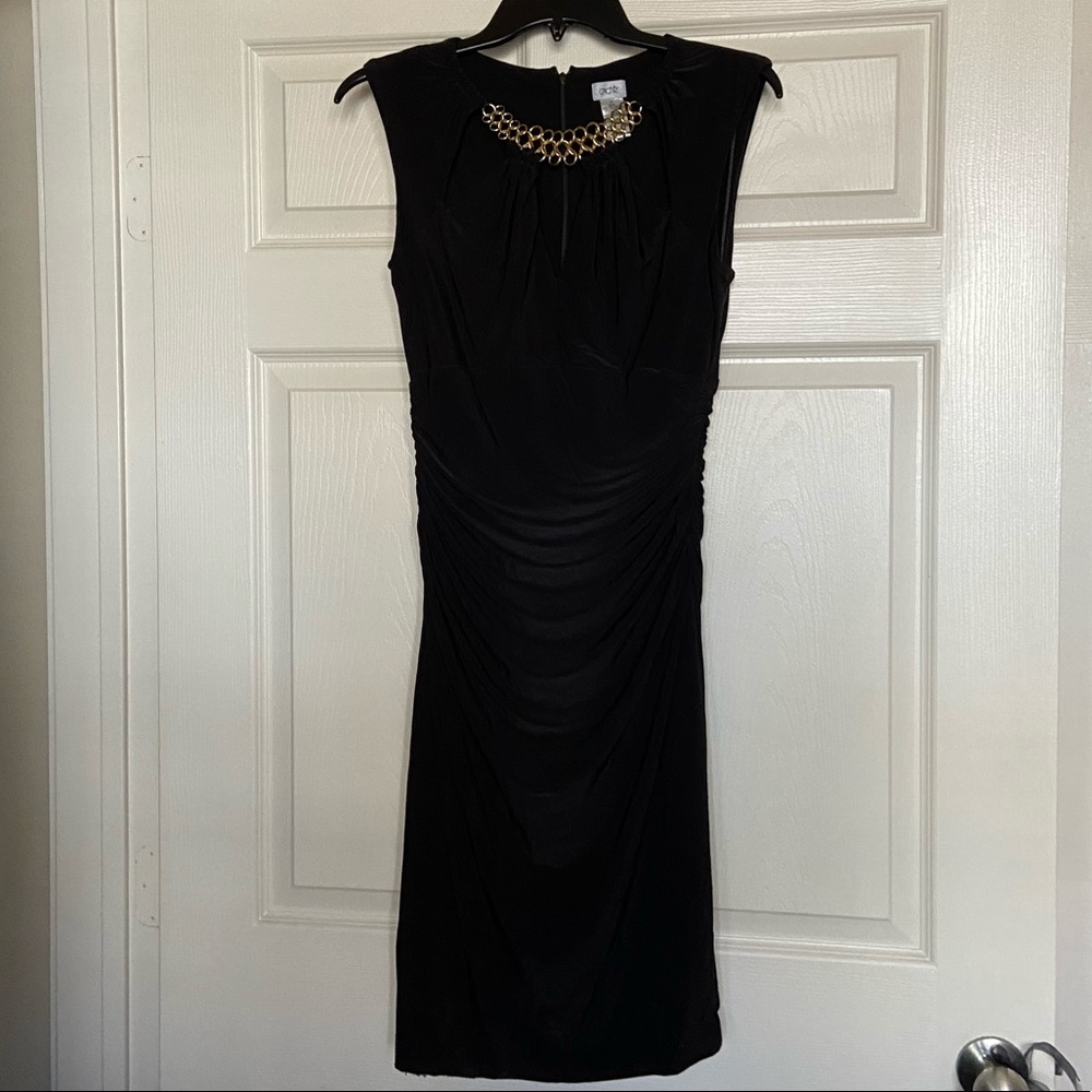 39 Cache Black Dress with Gold Chain and Cut Out Top